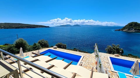 View (from property/room), Balcony/Terrace, Pool view, Sea view, Swimming pool, sunbed