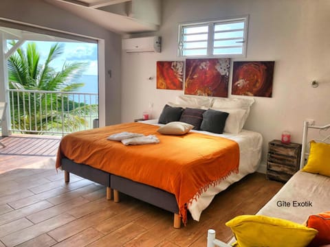 Patio, Bed, Photo of the whole room, Bedroom, Sea view, air conditioner