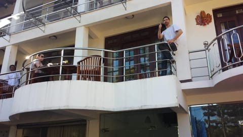 Property building, People, Balcony/Terrace, group of guests