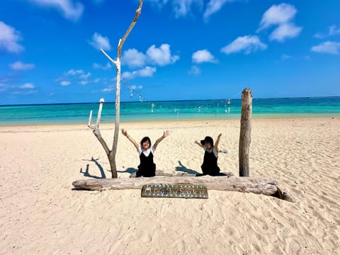 Day, People, Natural landscape, Beach, group of guests