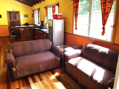 Fully equipped 2 bedroom tree top cottage, with large balcony in private garden House in San Ignacio