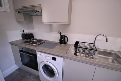 Coffee/tea facilities, Kitchen or kitchenette, toaster, washing machine