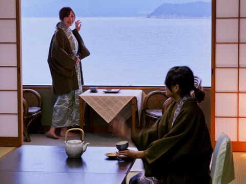 People, Seating area, Sea view, group of guests