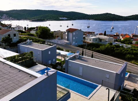 Property building, Nearby landmark, Day, Natural landscape, Mountain view, Pool view, Sea view, Swimming pool