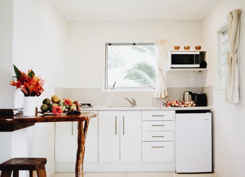 Dining area, minibar, stove, toaster, kitchen