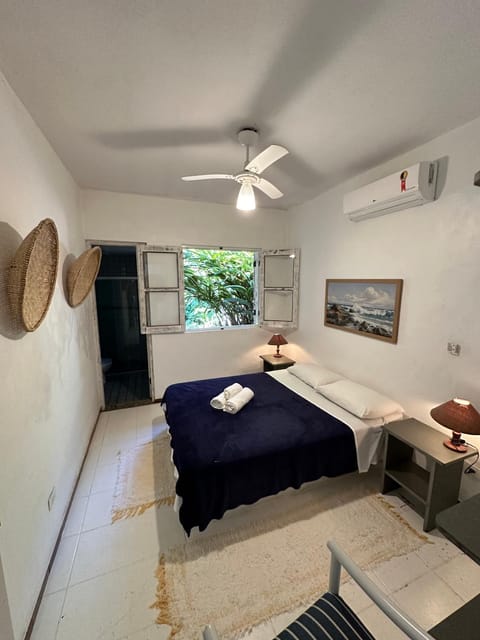 Bed, Photo of the whole room, Decorative detail, Bedroom, towels, air conditioner