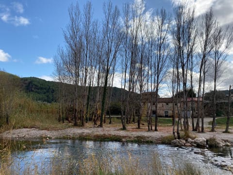 Property building, Natural landscape, Mountain view, River view