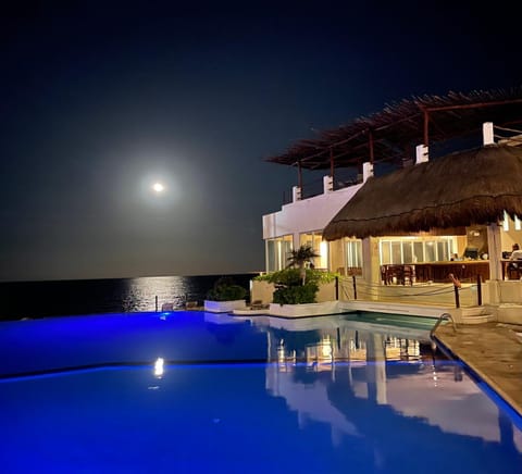 Property building, Night, Natural landscape, Pool view, Swimming pool, sunbed