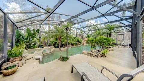 Oasis by the Sea Beach Front Community - Luxurious Pool Spa Home with Waterfall - Sleeps 10 - Come Haus in Palm Coast