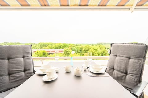Property building, View (from property/room), Balcony/Terrace, Seating area, Dining area