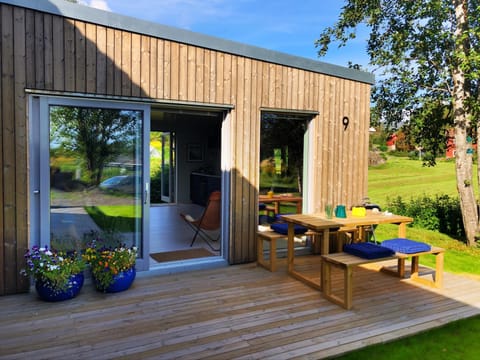 Property building, Patio, Dining area, Garden view
