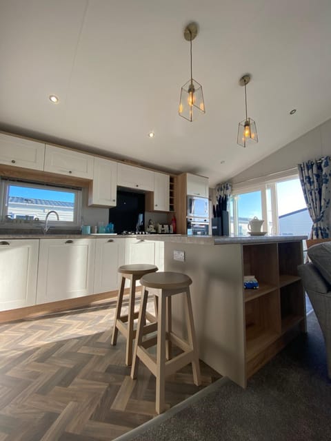 Brand new Sea view beach lodge Trecco bay 3 bedroom Condominio in Porthcawl