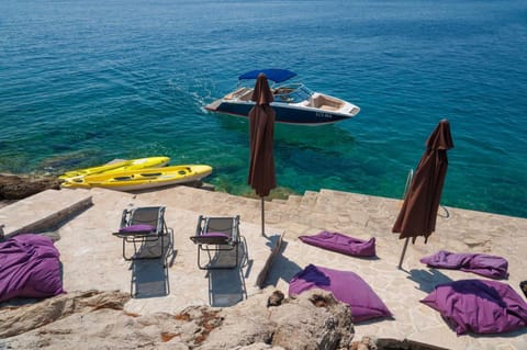 Day, Natural landscape, Beach, Pool view, Sea view, sunbed, towels