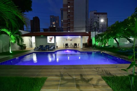 Property building, Decorative detail, Swimming pool, Sunset