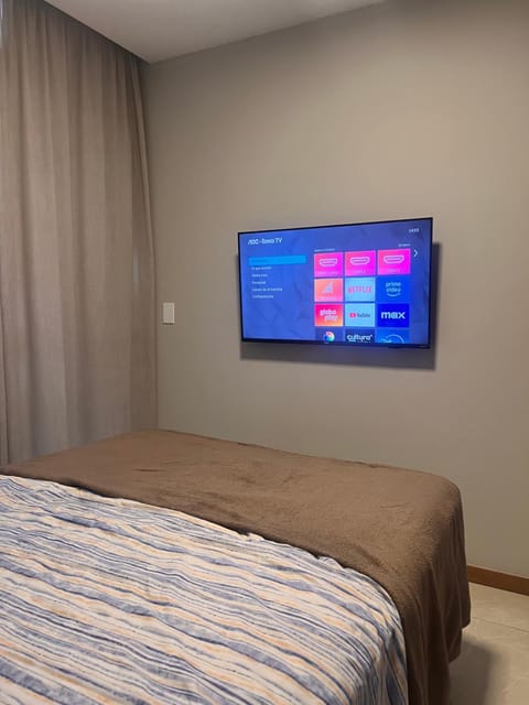 ESPETACULAR!! Apto na PRAIA DE ITAPARICA - Com Wi-Fi 360mbps, Ar Condicionado, Lavadora Lava e Seca, Estacionamento, Globoplay e Cozinha Completa Apartment in Vila Velha