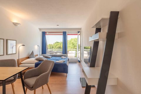 Bed, TV and multimedia, Photo of the whole room, Seating area, Dining area, hair dresser