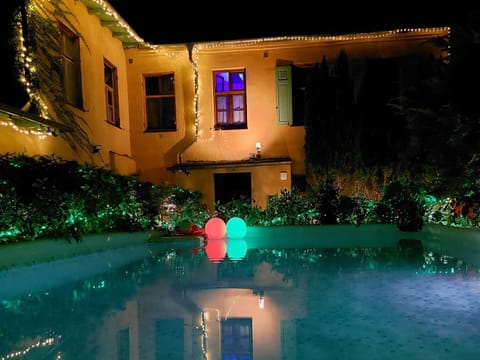 Property building, Night, Swimming pool