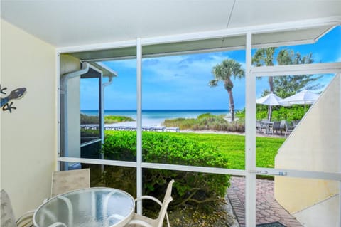 LaPlaya 101A Step out to the beach from your screened lanai Light and bright end unit Condo in Longboat Key