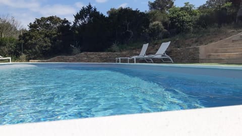 Swimming pool, sunbed