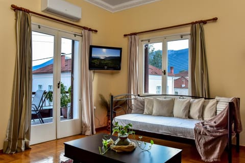 Living room, Seating area, City view, Mountain view