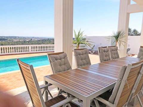 View (from property/room), Dining area, Swimming pool