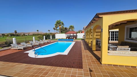 Patio, Pool view, Swimming pool, sunbed