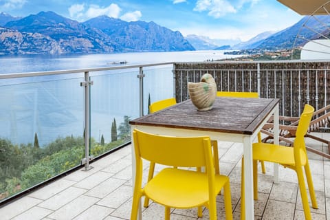 Patio, View (from property/room), Living room, Seating area, Lake view, Mountain view, Sea view