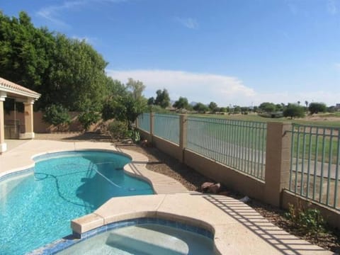 Spacious golf course house with pool heater, spa House in Avondale