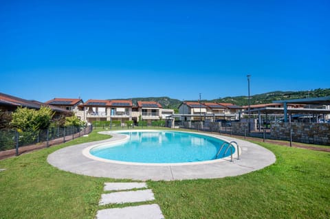 Property building, Spring, Day, Natural landscape, Pool view, Swimming pool