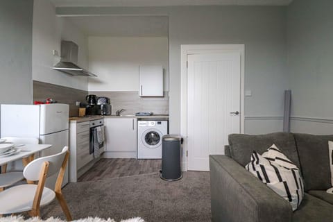 Kitchen or kitchenette, washing machine