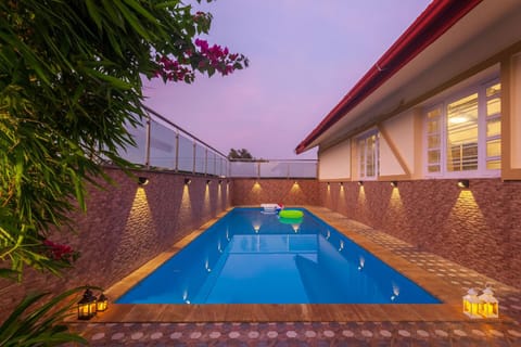 StayVista's V Square - Enjoy a pool and indoor games for a leisurely stay Villa in Lonavla