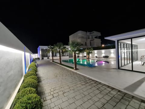 Property building, Patio, Facade/entrance, Garden, Swimming pool