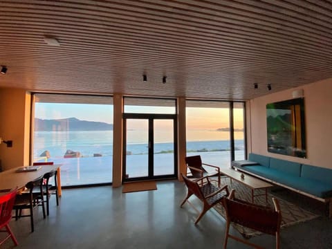 Living room, Seating area, Dining area, Beach, Sea view