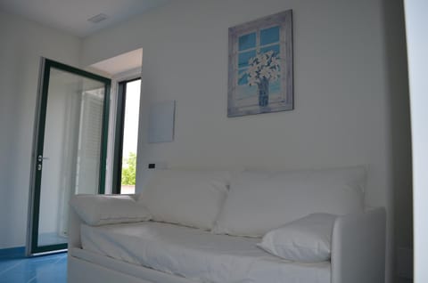 Bed, Living room, Seating area