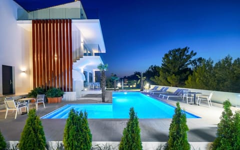 Property building, Night, Pool view, Swimming pool, sunbed