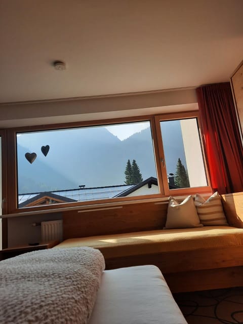 Bed, Natural landscape, Seating area, Bedroom, Mountain view
