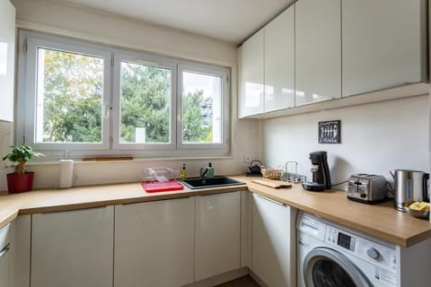 Kitchen or kitchenette, washing machine
