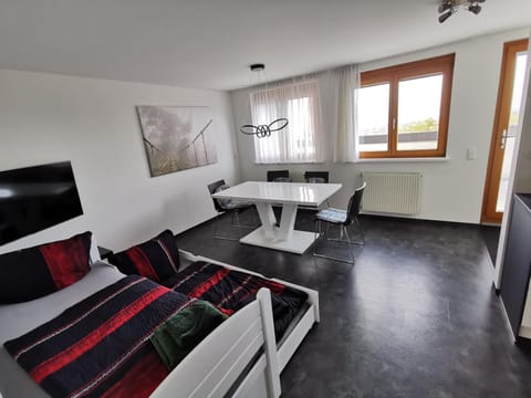 Facade/entrance, Bed, View (from property/room), Dining area, City view