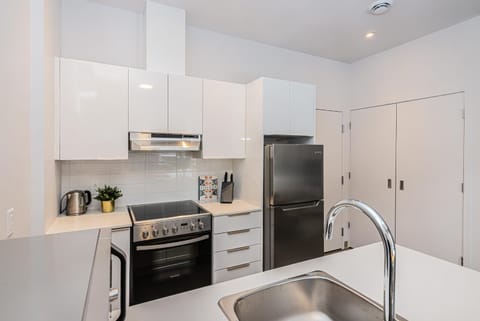 New and Perfectly Located 1 Bedroom Apartment by Den Stays Condo in Laval