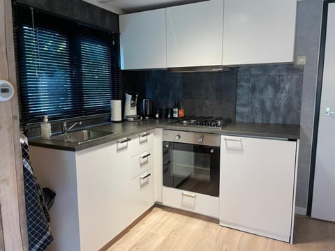 Kitchen or kitchenette, oven, stove