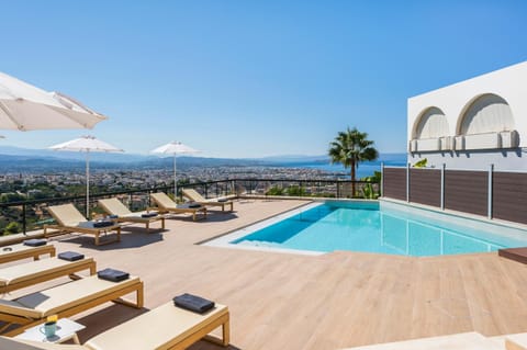 Property building, Patio, Day, Natural landscape, View (from property/room), City view, Mountain view, Pool view, Sea view, Swimming pool, sunbed, towels