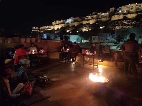 Restaurant/places to eat, Night, People, View (from property/room), Balcony/Terrace, group of guests