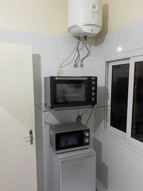 Kitchen or kitchenette, stove, kitchen