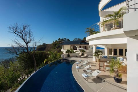 Property building, Patio, Day, View (from property/room), Balcony/Terrace, Pool view, Sea view, Swimming pool