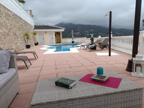 Natural landscape, Mountain view, Pool view, Swimming pool, sunbed, towels