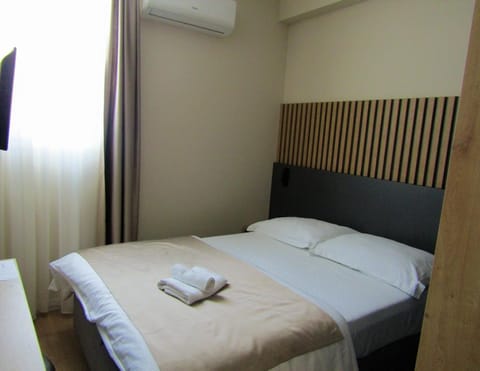 Bed, Photo of the whole room, Bedroom, towels, air conditioner