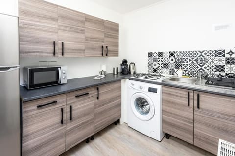 minibar, stove, washing machine, dryer