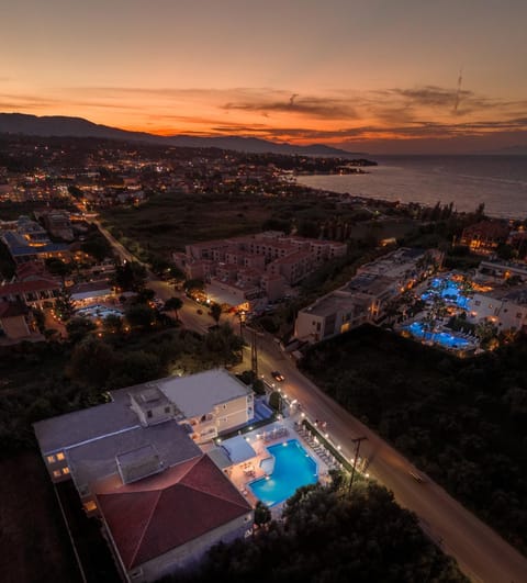 Property building, Natural landscape, Bird's eye view, Sea view, Swimming pool, Sunset