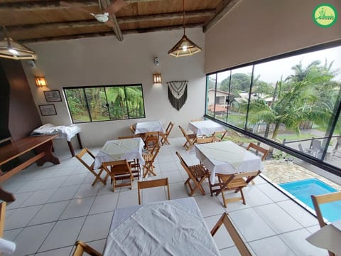 Day, View (from property/room), Seating area, Dining area, Pool view