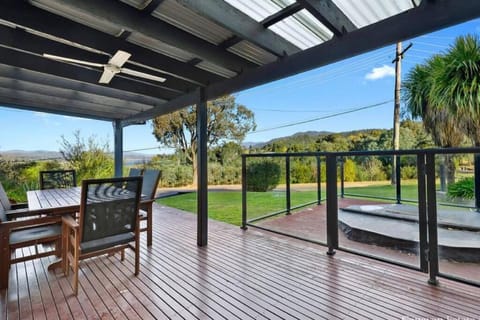 Relax in the spa with views opposite Lake Eildon House in Goughs Bay